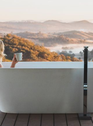 Woman enjoying her stay at Sierra Escape, Piambong near Mudgee