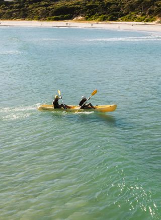 Young people kayaking near The Pass, Cape Byron Kayaks, Byron Bay