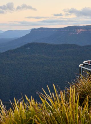 Couple visits and looks at view, Scenic World, Katoomba