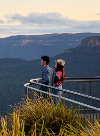 Couple visits and looks at view, Scenic World, Katoomba