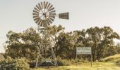 A Welcome to Balranald sign posted besides a local windmill at Balranald , Murray