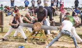 Sawyers competing in a wood chopping challenge at the 2017 Deni Ute Muster in Deniliquin, Riverina 