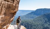 Couple enjoying a walk along the Wentworth Falls Track in the Blue Mountains National Park