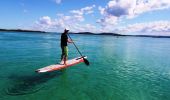 A man enjoying stand up paddling with Lake Mac Kayak and Bike Hire, Lake Macquarie