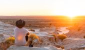 Man watching the sunset at the Walls of China in Mungo National Park - Mungo - Outback NSW