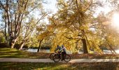 Cyclists riding the foreshore path at Noreuil Park, Albury