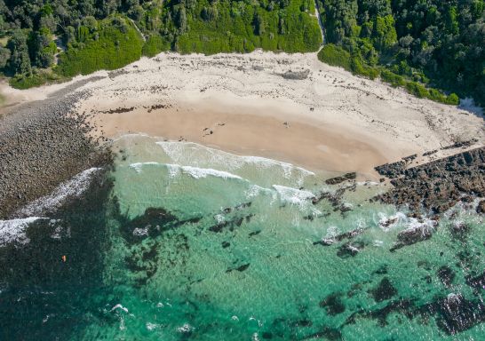 Coastal aerial of Pebbly Beach and Bicentennial Walk in Forster, North Coast