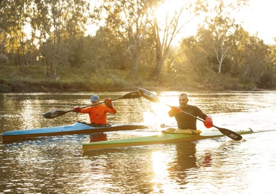 Friends enjoying a morning kayak along the Murray River in Albury, The Murray