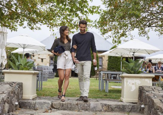 Couple enjoying a visit to Cupitt's Winery in Ulladulla, Jervis Bay and Shoalhaven