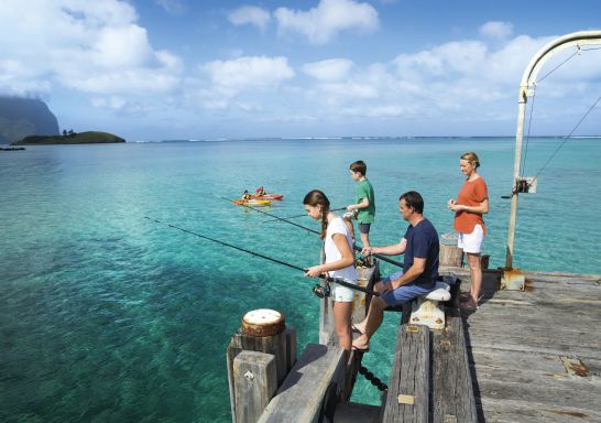 Family enjoying a day of fishing from the Lord Howe Island Wharf