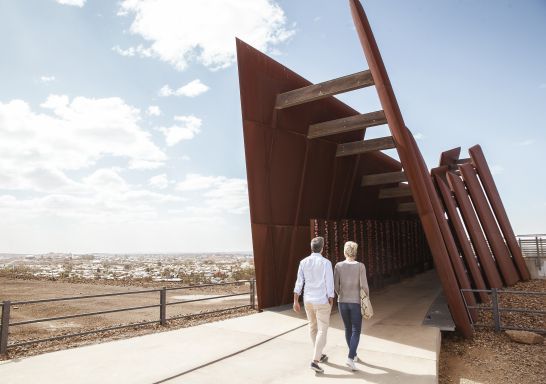 Couple visiting the The Line of Lode Memorial in Broken Hill, Outback NSW