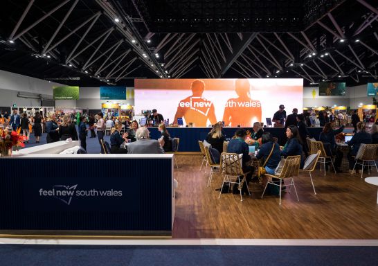 People sitting in booths, International Convention Centre (ICC), Australian Tourism Exchange, Darling Harbour 